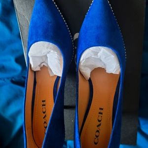 Coach Pumps